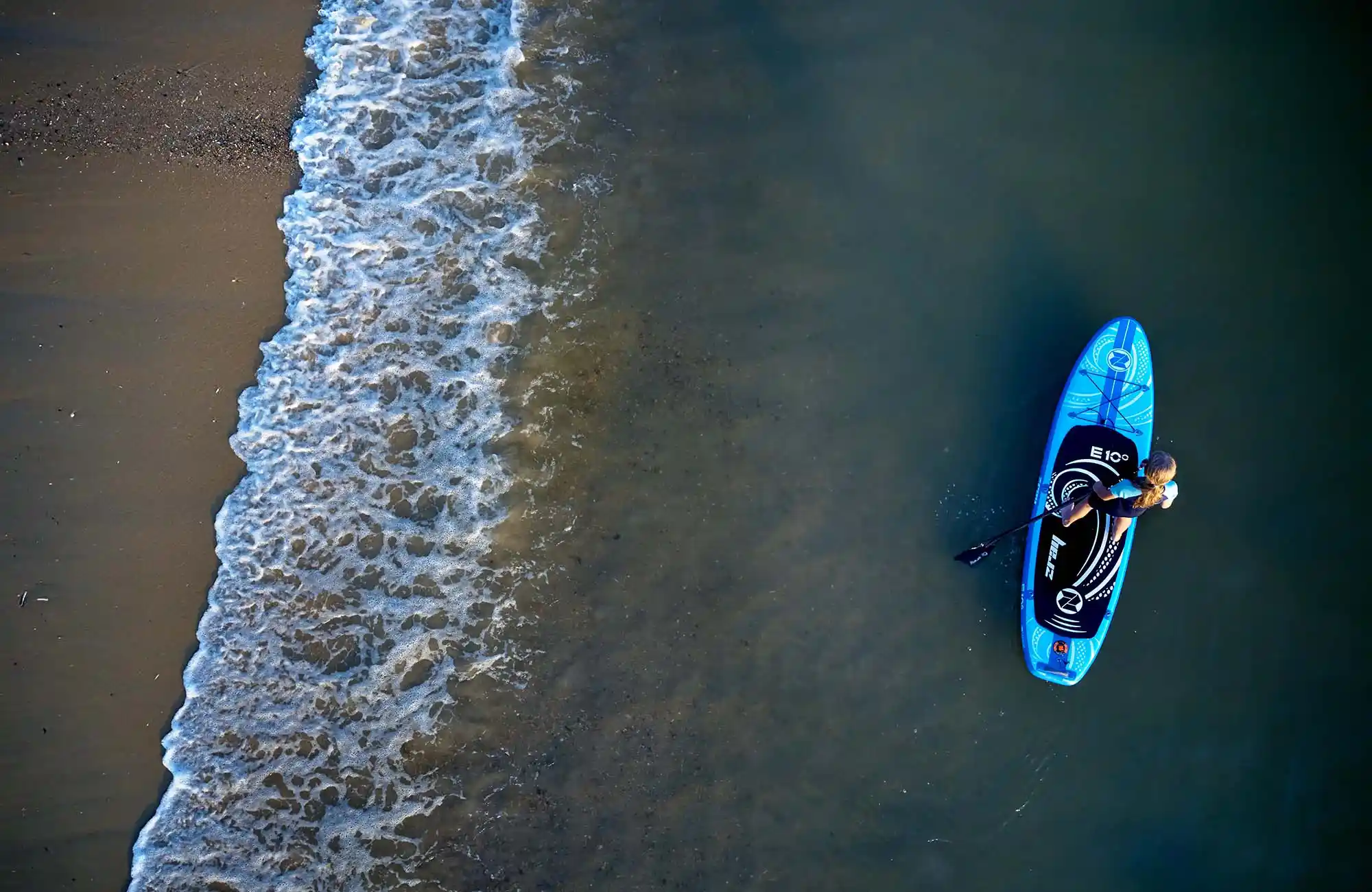 klithjem_badehotel_strand_paddleboard_tilde.webp